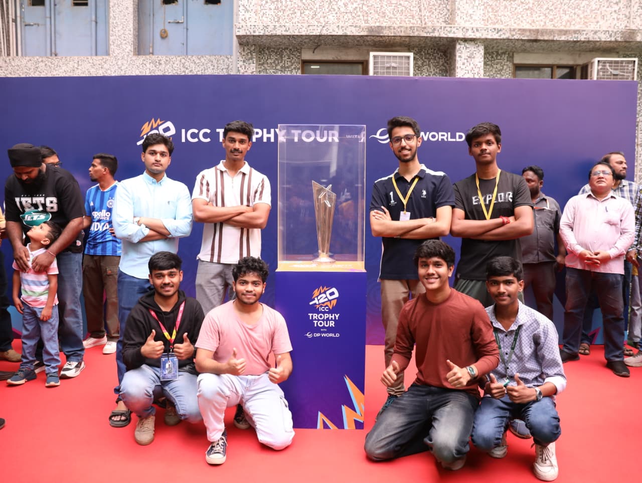 Students of Pillai College of Engineering,  Navi Mumbai pose with the ICC Men’s T20 World Cup 2026 trophy during its visit (1)
